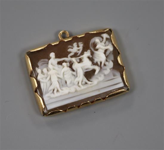 A small rectangular yellow metal mounted cameo pendant decorated with lady in a chariot with attendants, 22mm.